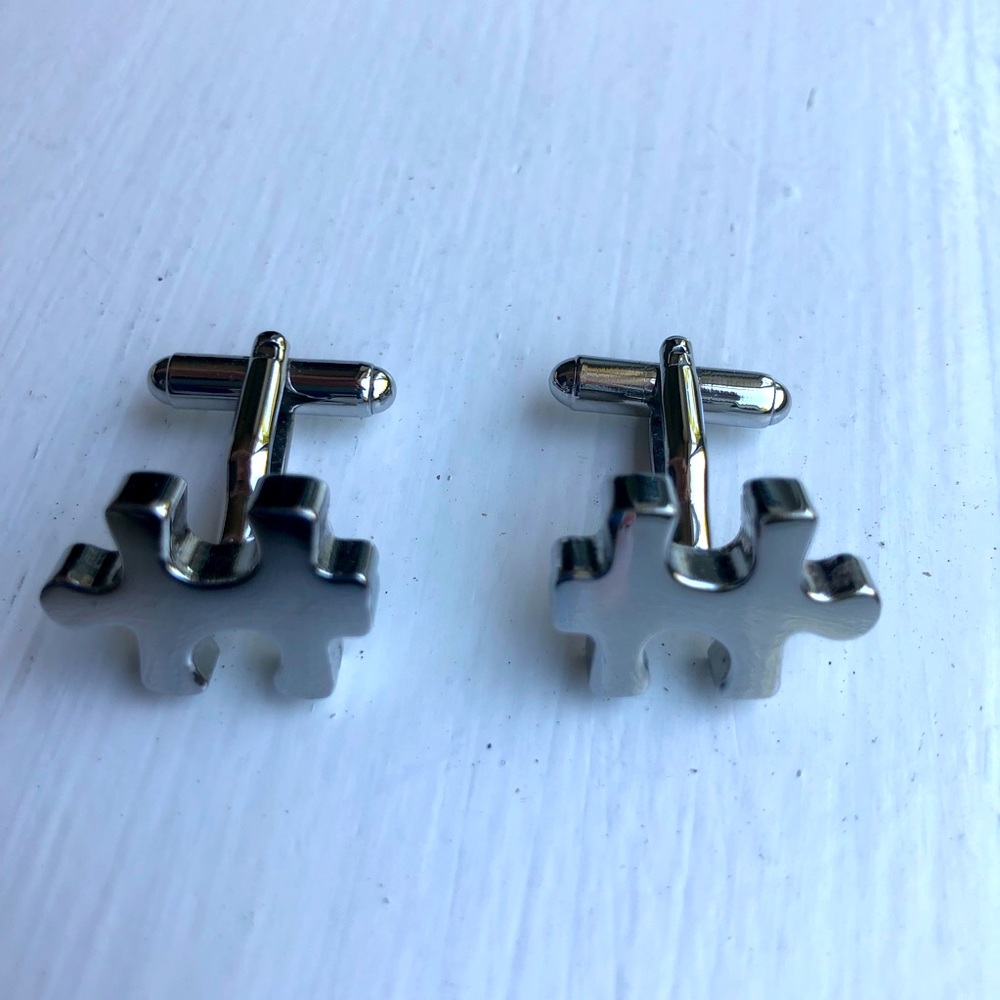 Silver puzzle cuff links